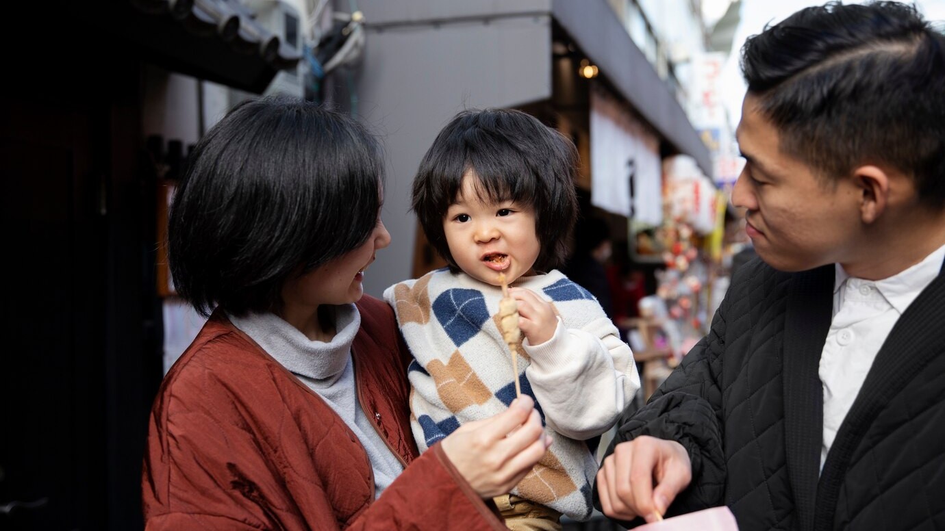 Young family spending time with their toddler