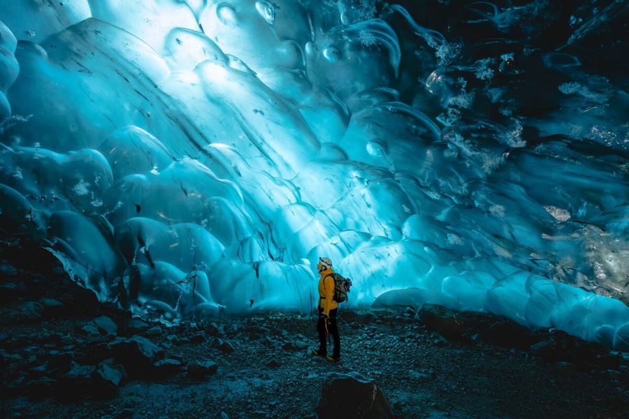 blue ice cave with glowing natural light