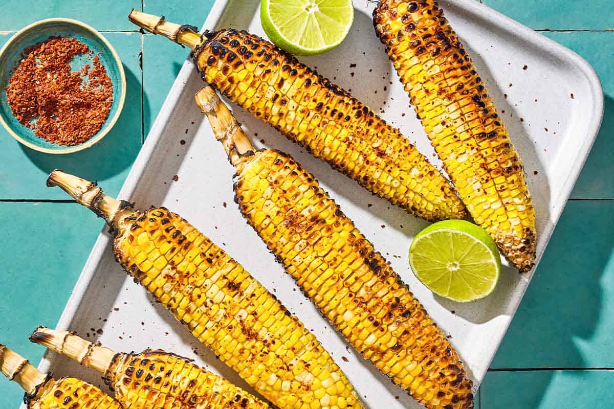 food stalls with seafood and grilled corn