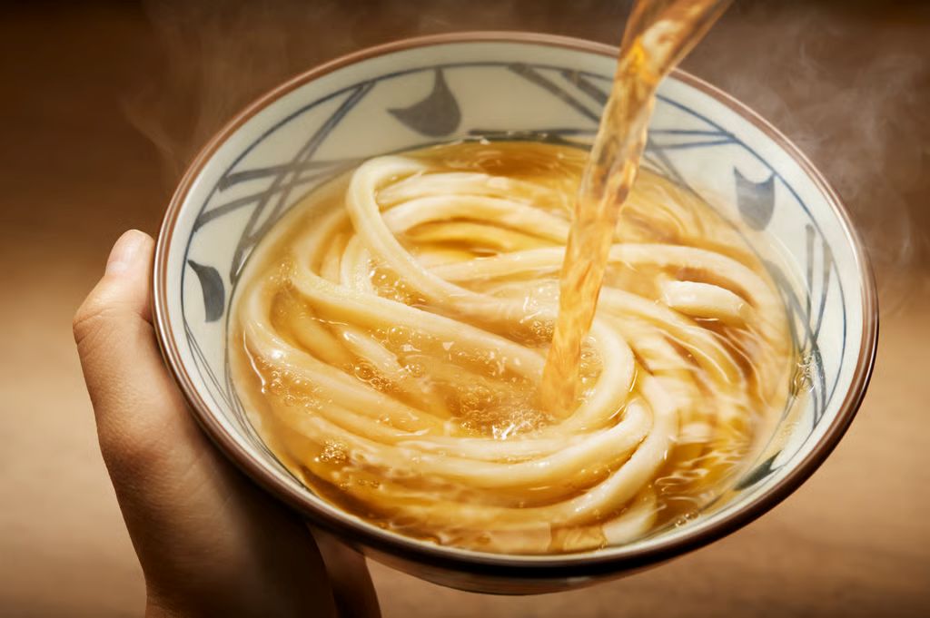 steaming udon in a big outdoor